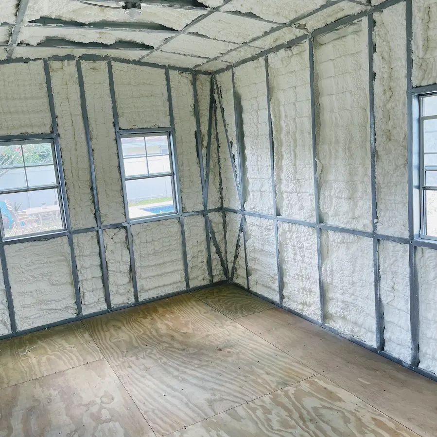Closed-cell spray foam insulation applied to wall cavities in a residential project in Venice